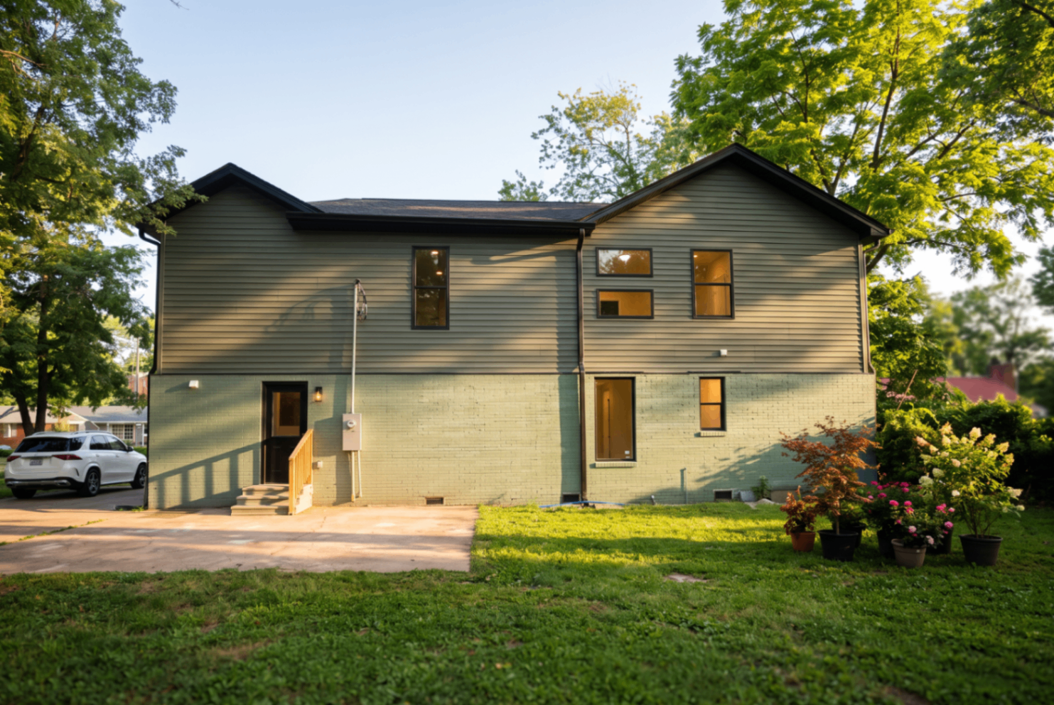 Rear exterior and private backyard of 5033 Collinwood Drive