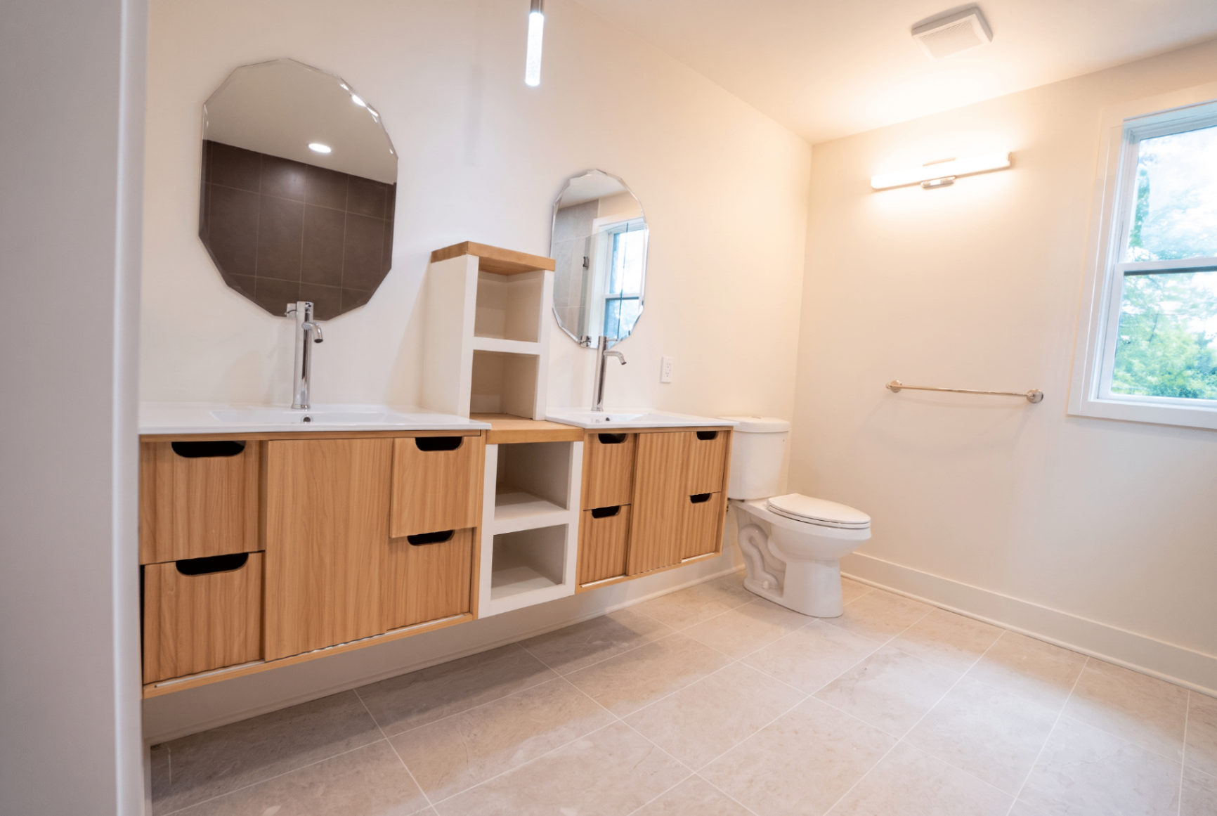 Double oak vanity with sculpted mirrors